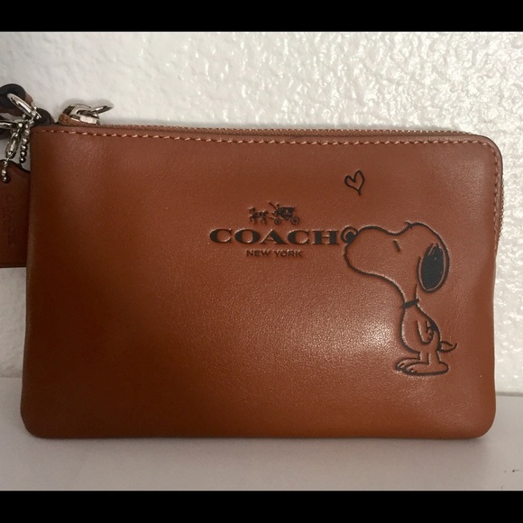 Coach Handbags - Coach x Snoopy Limited Edition Leather Wristlet.